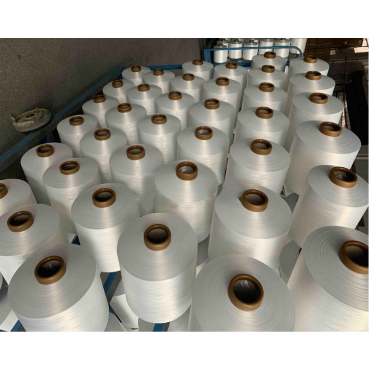 Custom color white filament polyester dty 150/48 150D 48F big twist tubular logo yarn for woven ribbon label industries