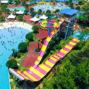 Quality Customized Size Water Park Equipment Fiberglass Large Boomerango Water Slide Suitable for Holiday Resorts wholesale