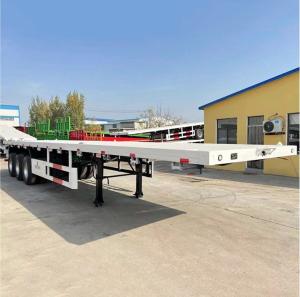 Quality 3 Axles Tri Axle Cargo Transportation Flatbed Container Chassis Semi Trailer In Sell wholesale