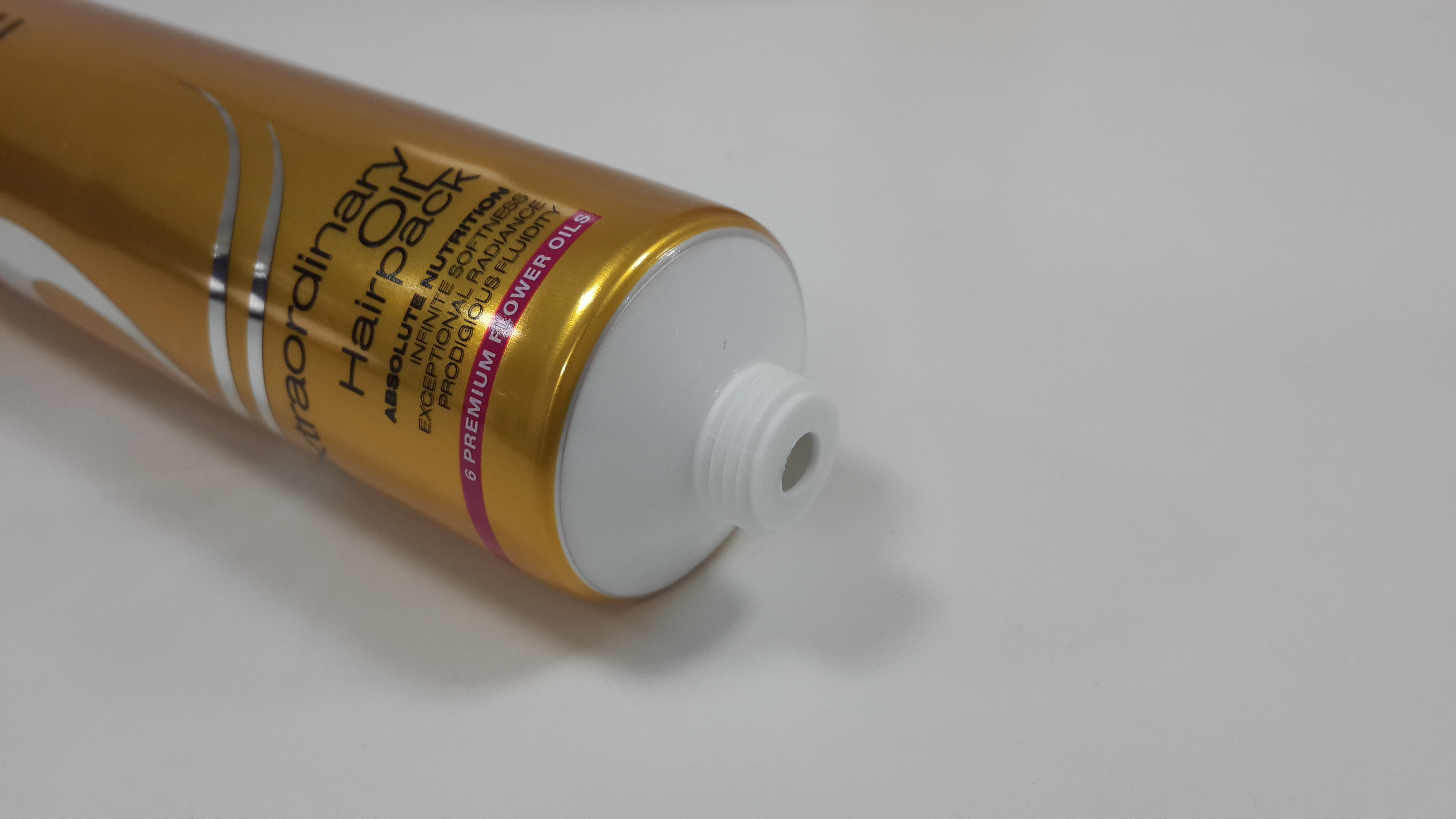 Eco Friendly Glossy Cosmetic Packaging AL Barrier Plastic Tube With Window Design Chemical Resistance For Hairpack