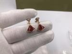 earring in 18 kt gold
