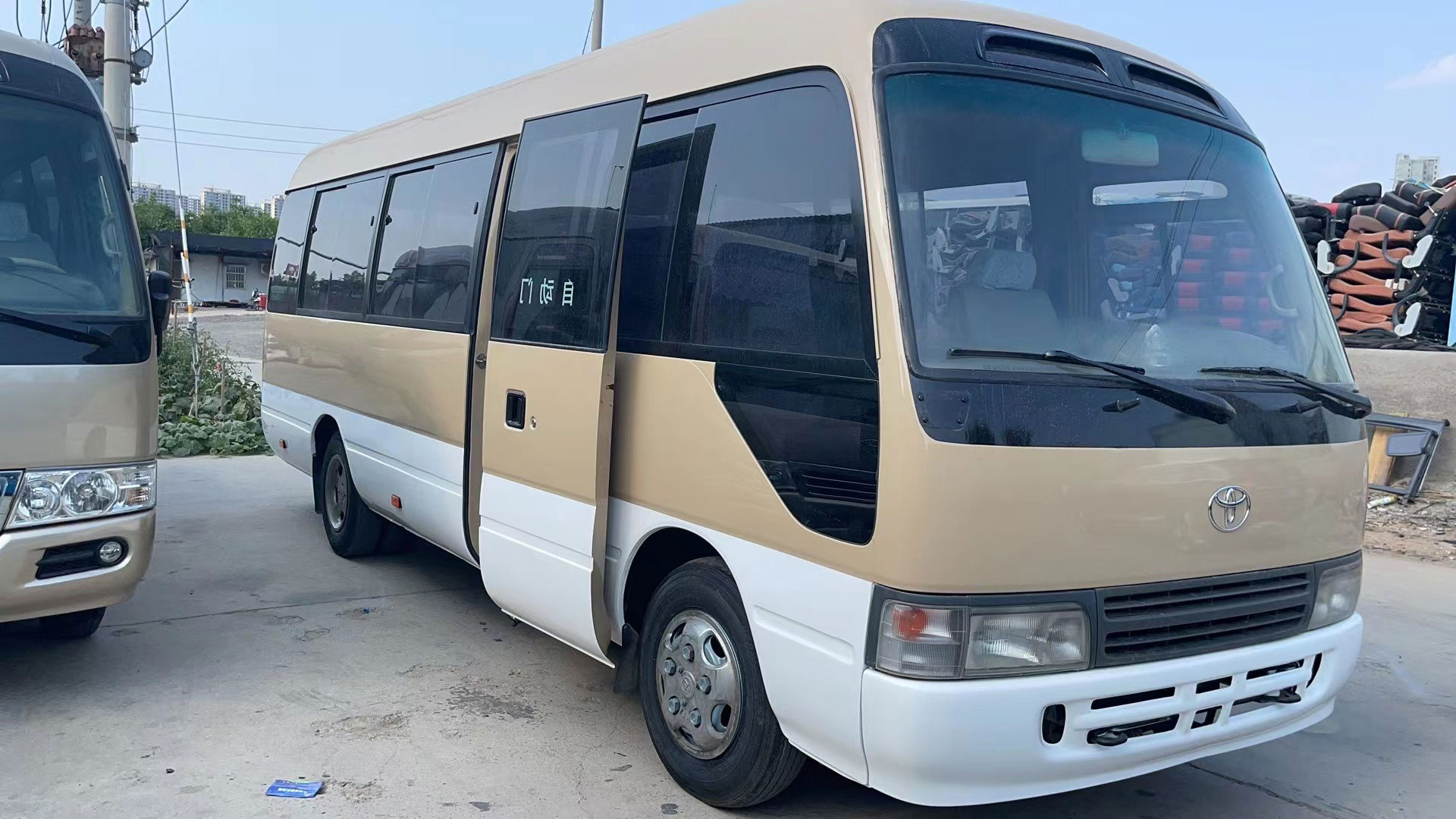 Affordable Used Left Hand Drive Toyota Coaster Bus with Optional Air Conditioner