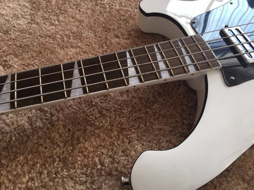 4 string bass guitar set in neckshark inlay on rosewood black ABS binding set in neck RIC 4003 bass guitar