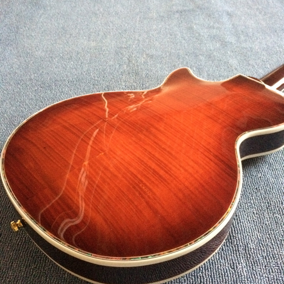 A new style of custom guitar, double F holes,Gold hardware,Flame Maple Top & Back