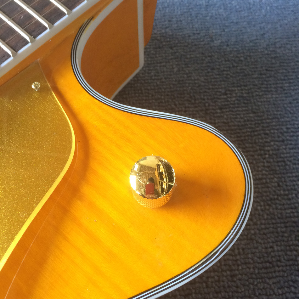 New style high-quality hollow body jazz electric guitar, Double F holes,Tremolo system ,Flame Maple top
