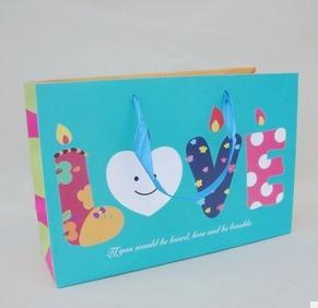 Quality 2014 new design christmas gift paper bag wholesale