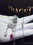 Piaget full diamonds red tourmaline rose necklace of 18kt gold with yellow gold