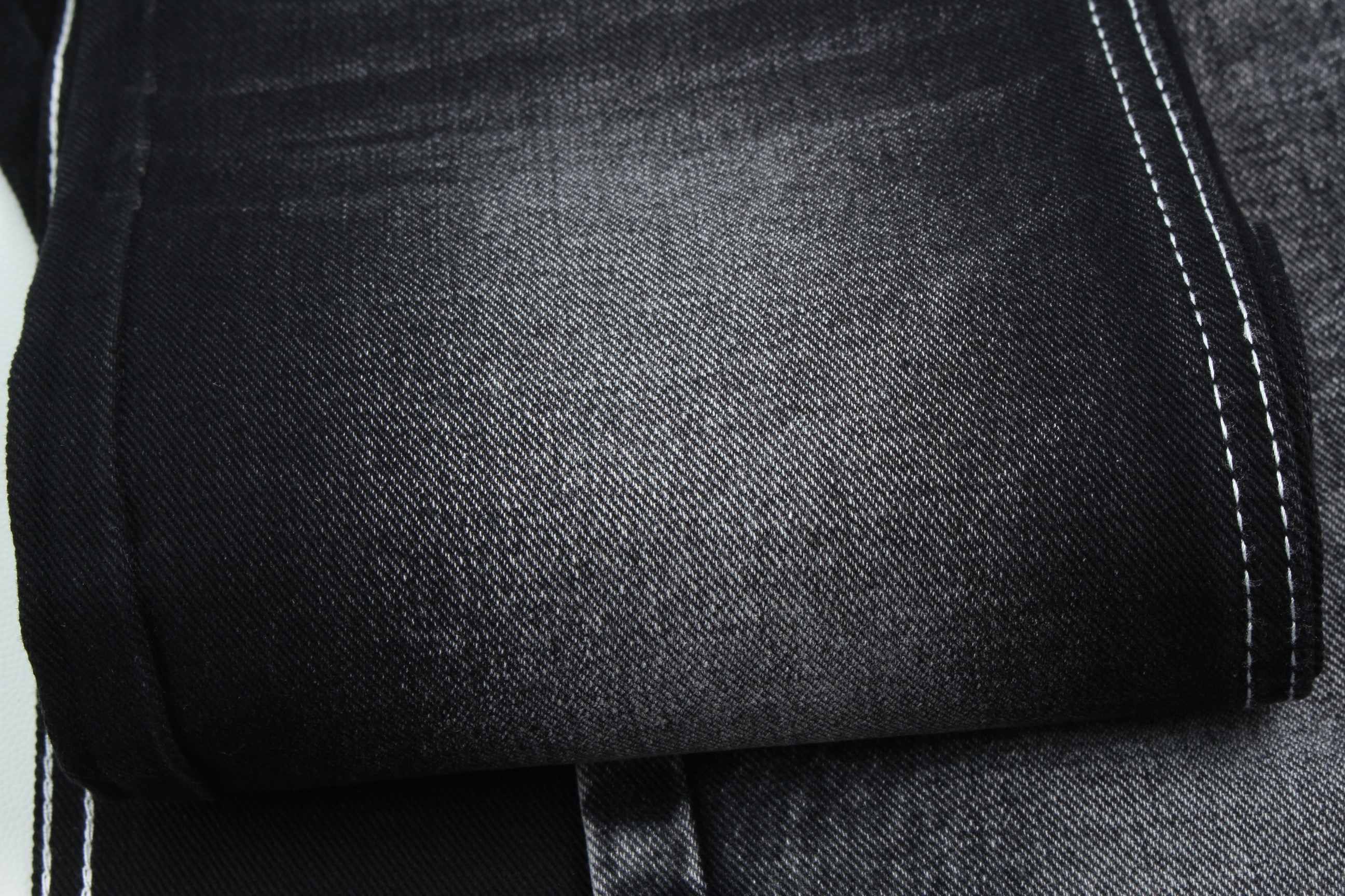 13.5oz Super Dark Black Color Denim Fabric Rigid 100% Cotton Recycle Yarn For Worker Jean Cloth Black Black Backside