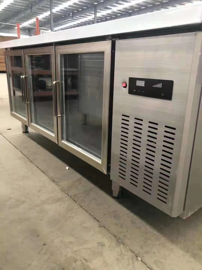 Stainless steel commercial refrigerator workbench in the back kitchen of hotel restaurant 2