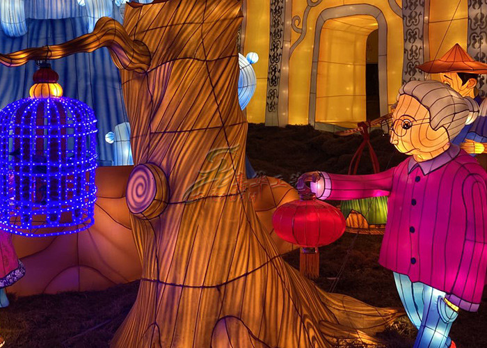 Beautiful Golden Fabric Chinese Lanterns Tree Interacting With Children And Adults
