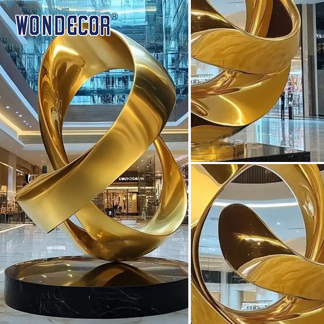 Large indoor hotel lobby Pop Art golden stainless steel statue
