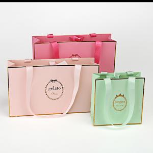 Quality 250gsm Paper Gift Bags With Handles Hot Stamping Retail Green Bags With Gold Rim​ wholesale