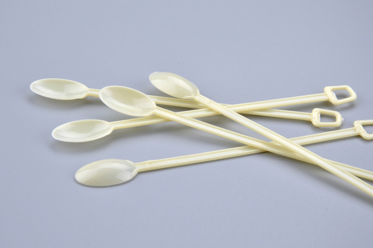 The disposable coffee soup with small spoon coffee stir bar muddler yellow