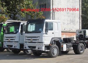 Quality SINOTRUK HOWO ZZ4257S3241W 6x4 Left hand drive 371hp tractor truck wholesale