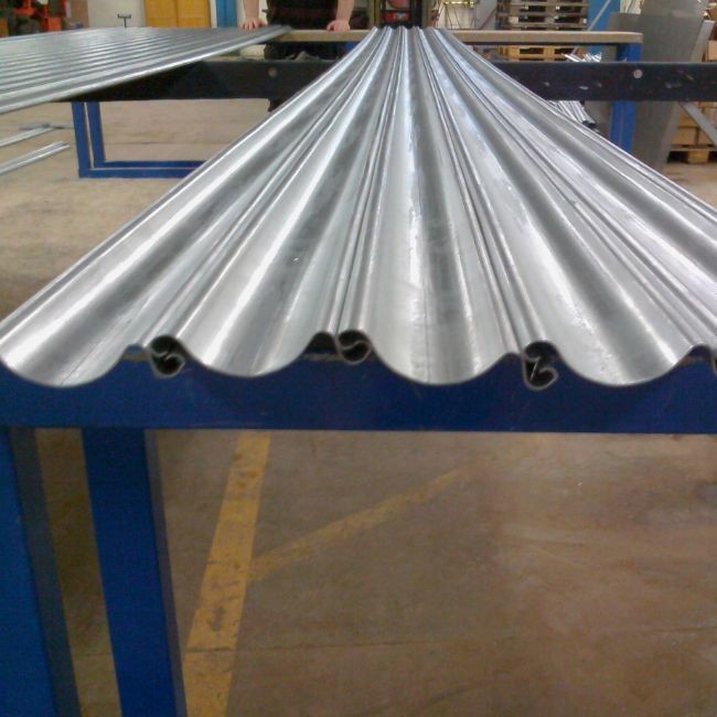 Steel Rolling Shutter Door Roll Forming Machine Cr12 Roller For Food Beverage Shops