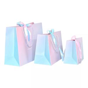 Quality Custom Logo Holographic Gift Paper Clothing Bags ISO Gradient Drawstring Paper Bag wholesale