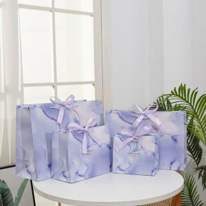 Quality New Style Bow Hand Gift Shopping Bag Custom Color Logo Design Kraft Paper Shopping Bag wholesale