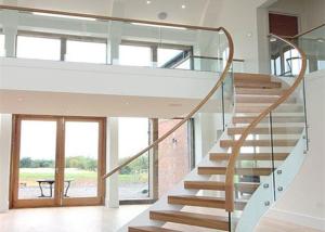 Quality Solid Wood Apartment Stairs Carbon Steel Beam With Clear Tempered Glass Railing wholesale