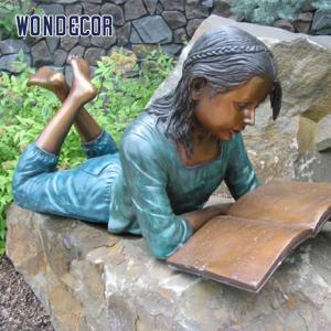 Quality Customized outdoor garden decoration, life-size bronze statue of a girl reading on her stomach wholesale