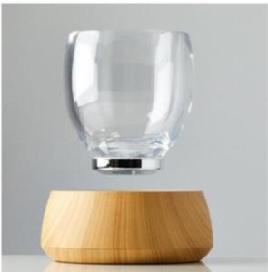 Quality 360 rotating magnetic floating bottom coffee cup water cup wholesale