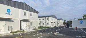 China Modified Shipping Container Hotel 3 Storey Container Apartment With AC And Furniture For Students Or Workers on sale