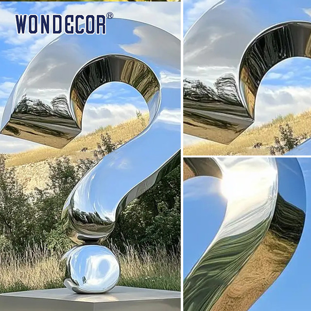 Large scale modern landmark symbol sculpture, polished stainless steel question mark statue