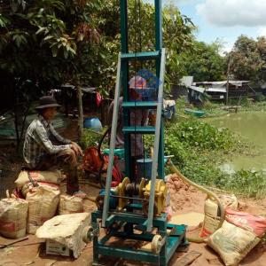 China Small portable rig but powerful 100m 500kg borehole drilling machine rigs portable water well drilling rigs on sale