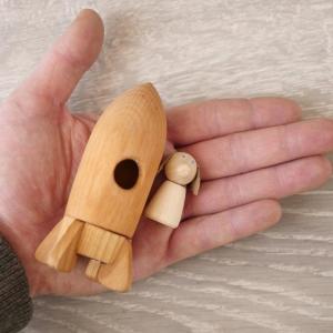 Quality Multifunctional Wooden Rocket Toy , Wooden Activity Rocket With Astronaut Dog wholesale