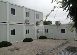 Quality Sandwich Panels Structure Flat Pack Container House With Heat Insulation Design wholesale