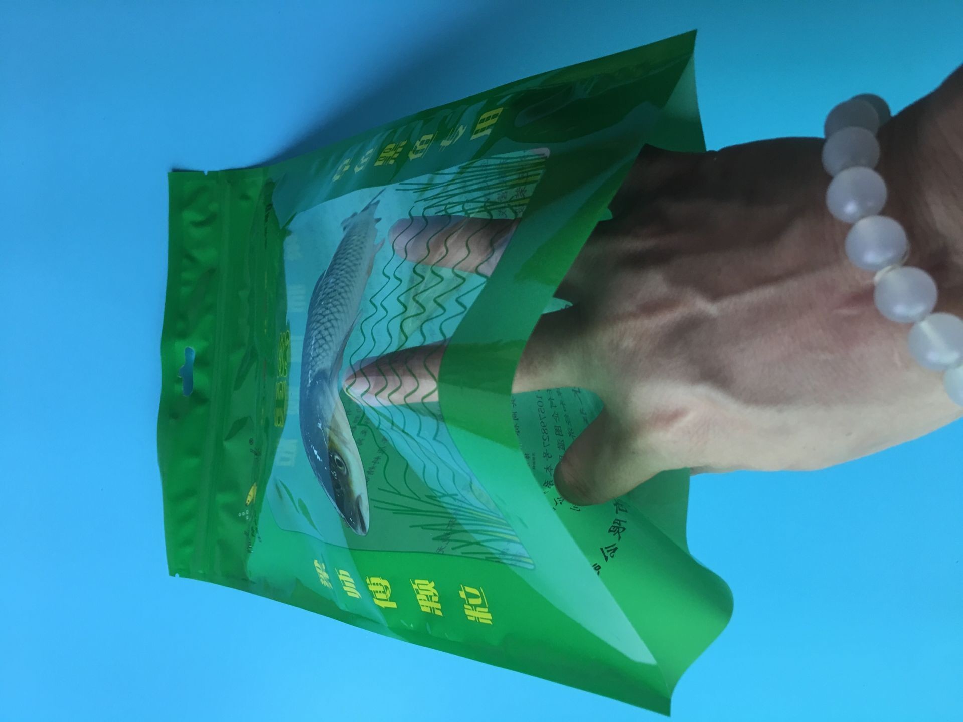 Custom Printed Green 3 Sided Sealed Composite Fish Bag With Transparent Window In Front
