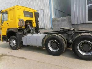 Quality Yellow DOT Certified Sinotruk HOWO 6X4 10 Wheeler Tractor Trucks with Tires wholesale