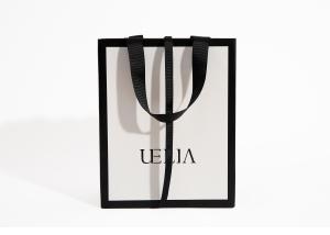 Quality Custom Printed White Luxury Boutique Paper Bag 250g For Clothes wholesale