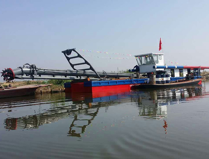 Dredging Vessel Red Color Designed To Dig To A Depth Of Twelve Meters