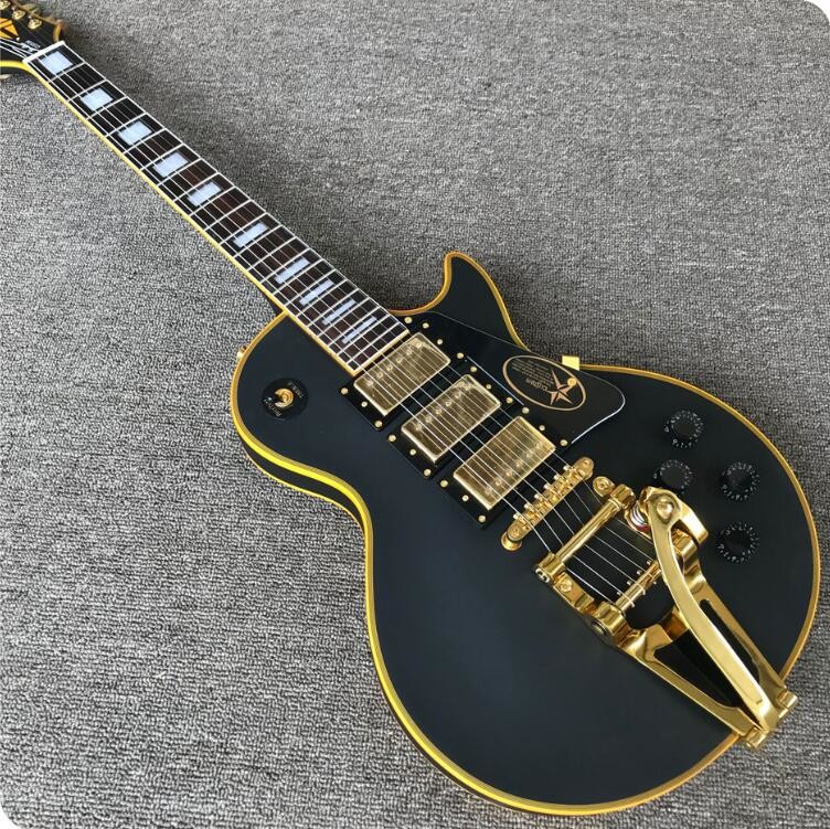 Grand LP electric guitar black with bigsby, yellow body binding, 3 pickups, gold hardwares