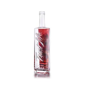 Quality Embossed Lettering Luxury Spirits Bottle 900g 750ml Clear Glass Bottles wholesale