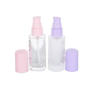 Quality 30ml Transparent Empty Foundation Bottle With Pink Or Purple Plastic Caps wholesale