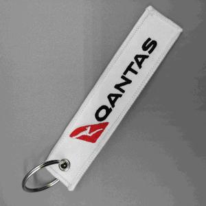 China Polyester Zinc Alloy Custom Embroidered Keychain Elegant Aviation Tag Keychain on sale