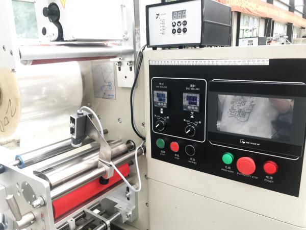 Photoelectric Eye Automatic Bag Packing Machine , Touch Screen Horizontal Flow
