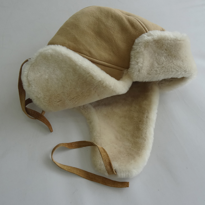 The queen of quality sheepskin trapper winter hat with ear flaps