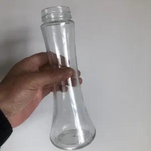Quality 350ml Round Fruit King Coconut Water Juice Beverage Glass Bottles with Lid wholesale