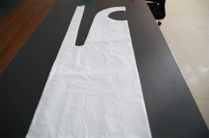 Quality White Disposable PE Apron Flat Packing , Sleeveless Plastic Aprons For Adults wholesale