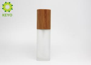 Quality Skin Care Round Frosted Glass Empty Cosmetic Bottles With Bamboo Cap In 50ml wholesale