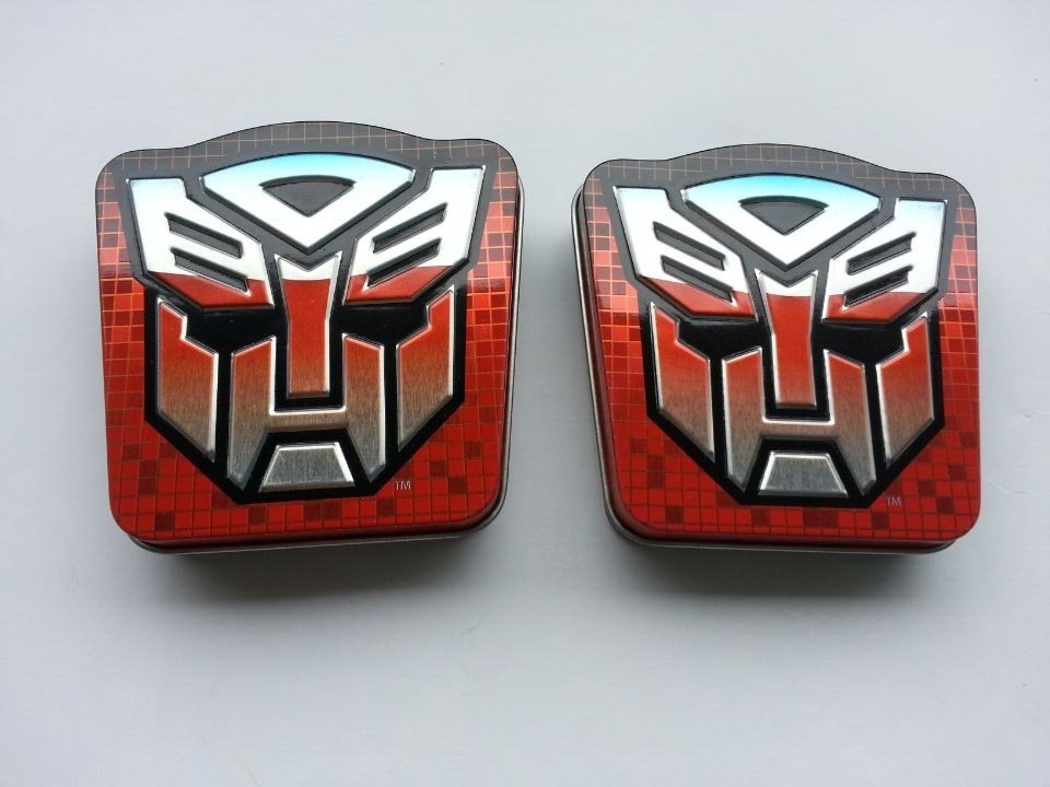 Transformer Shield Tin Candy Containers Size : 82*82*15mm For Small Sweet Food Packaging