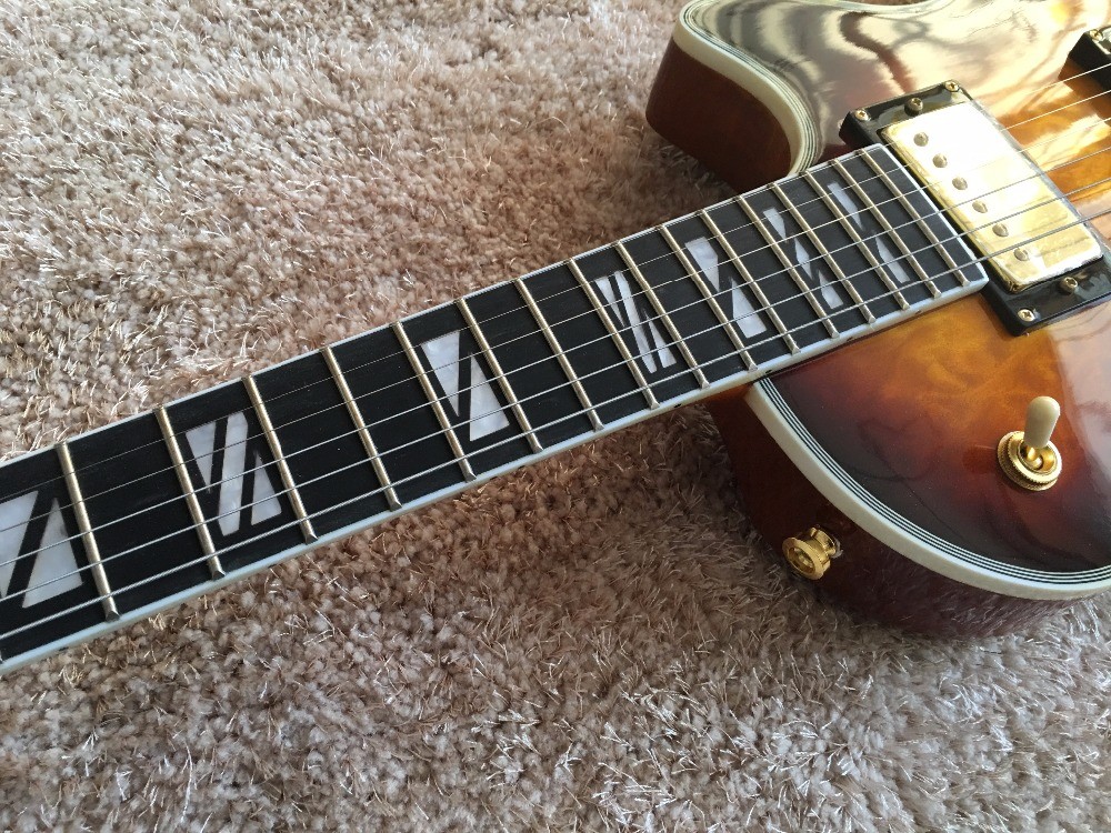 LP custom guitar tobacco sunburst quilted maple body Back contour and neck joint contour Ebony fingerboard custom guitar