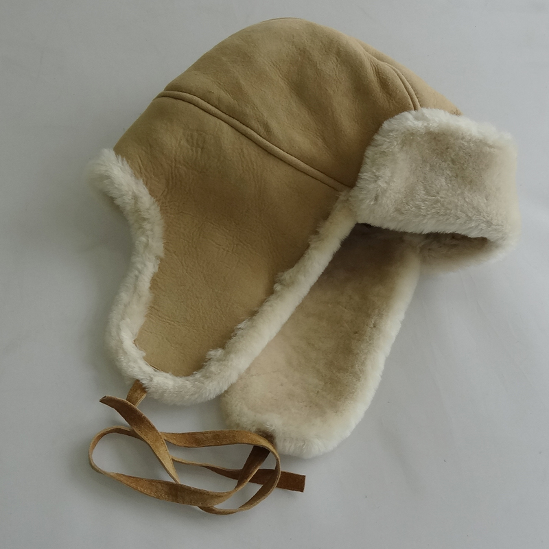 The queen of quality sheepskin trapper winter hat with ear flaps