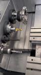 Dual Spindle Inclined Bed Machine For Simultaneous Bilateral Machining