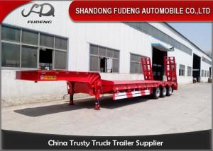 Quality 60T 4 Axles 12R22.5 Tire Steel Low Bed Semi Trailer wholesale