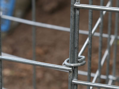 Two welded gabion panels are connected by the C ring.