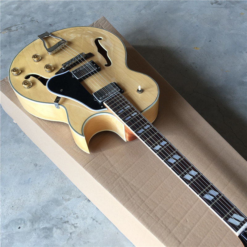Hollow body jazz guitar with maple body neck