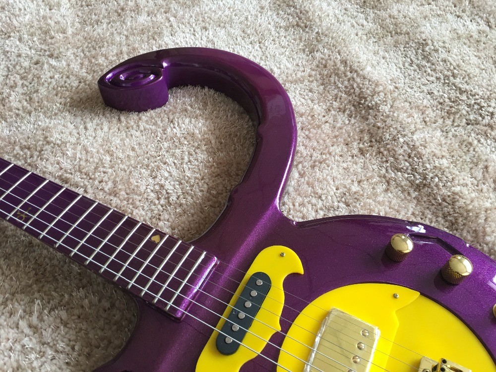 Custom guitar shop prince guitar Purple color boat anchor electric guitar with golden hardwares plastic pickguard